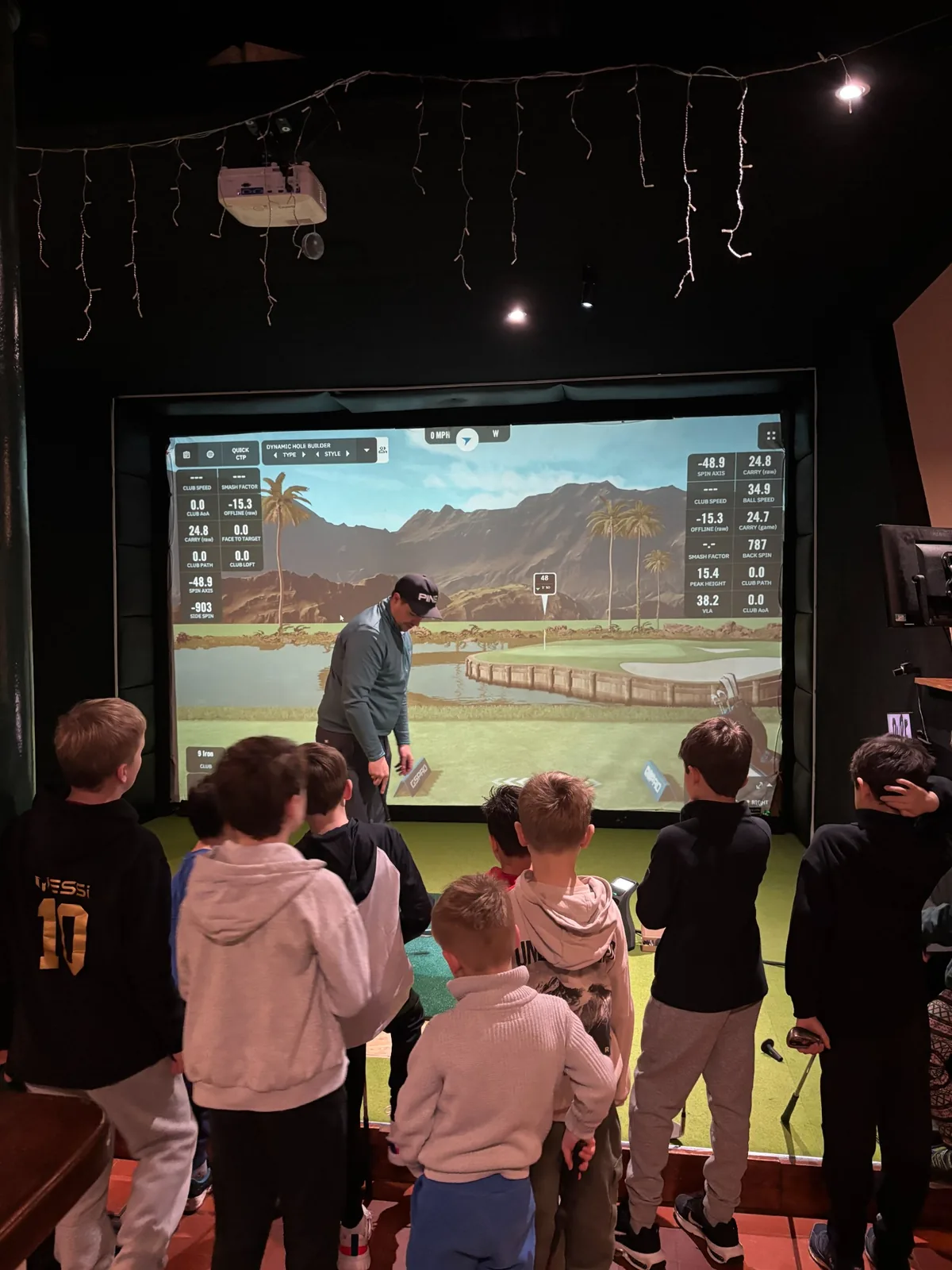 Junior group using the Pure Swing golf simulator